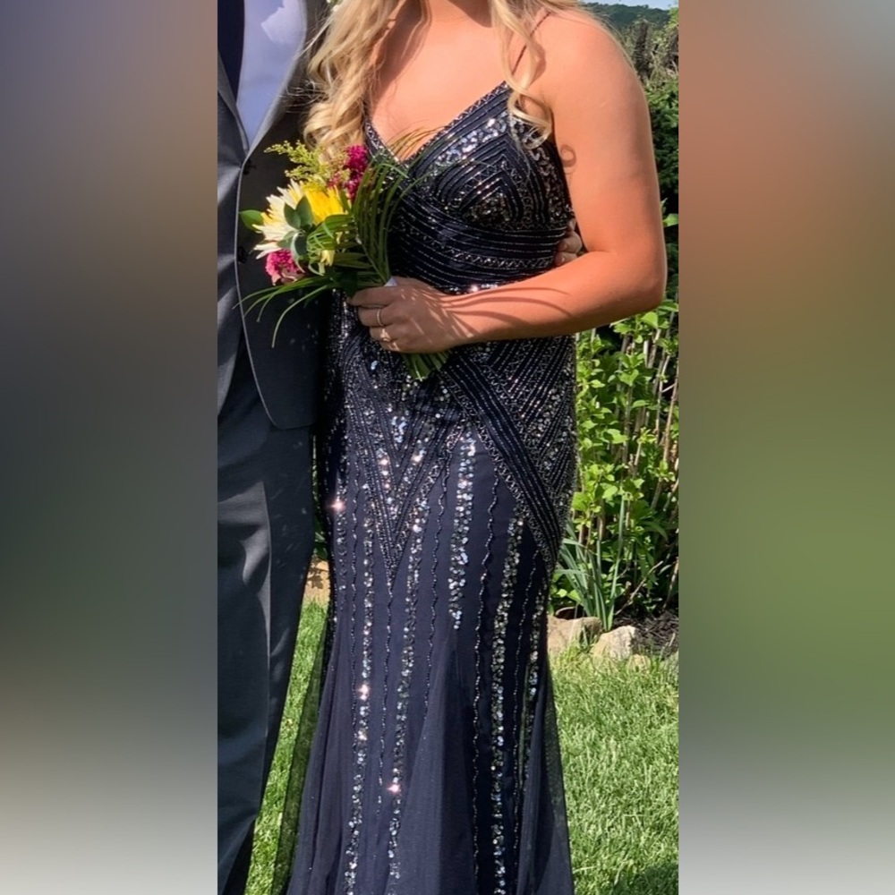 Brand new with tag navy blue and silver sequins prom dress. Size 7/8 juniors